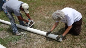 Phyllis helped cutting the PVC pipe that goes into the well 