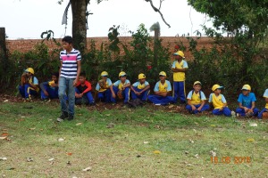 Isla Chica's  little league team supporting a school soccer match